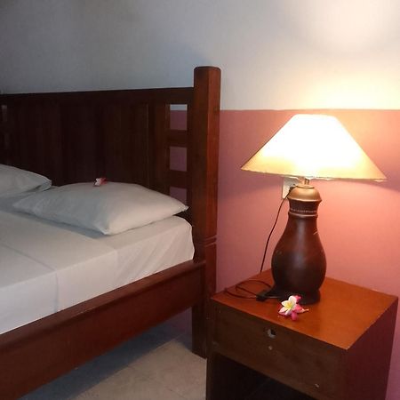 Kputra Homestay Amed Quarto foto