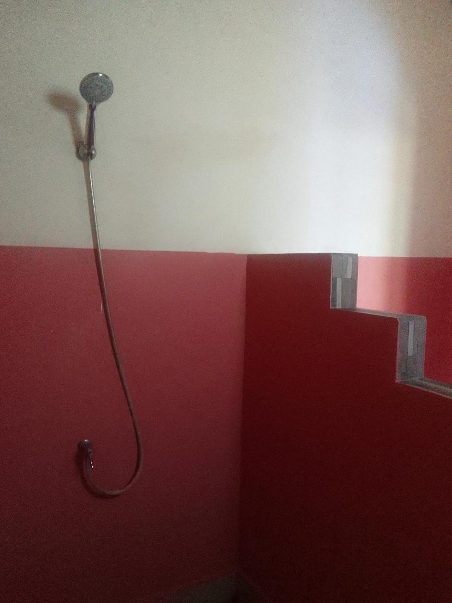 Kputra Homestay Amed Quarto foto
